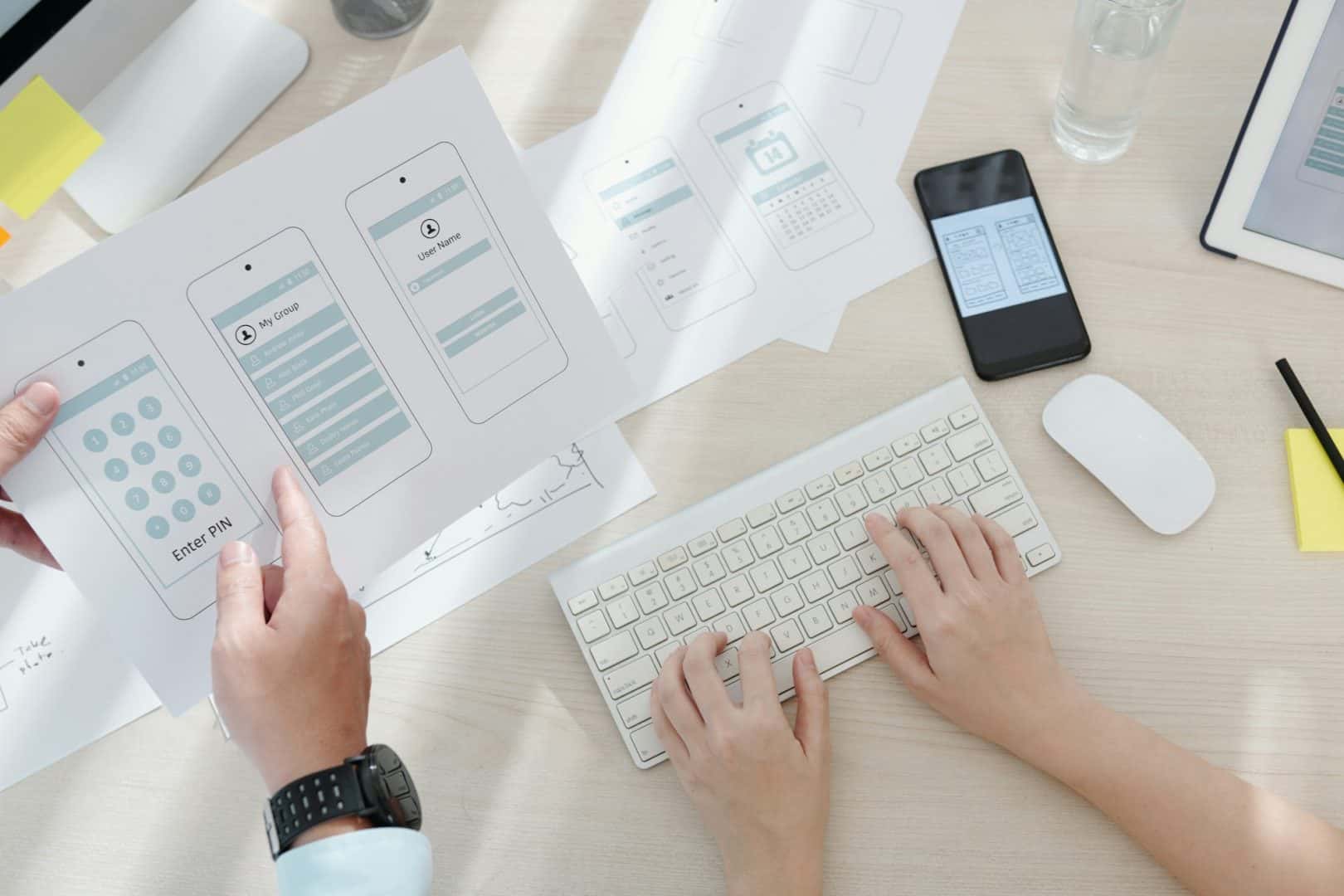 Designers Discussing Interface of Mobile App